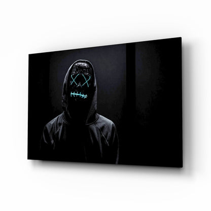 Figure in dark hoodie wearing neon cyan glowing mask with X eyes and stitched mouth design on black background.