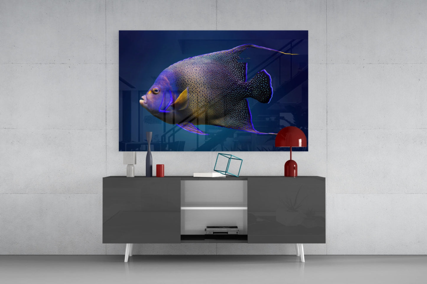 Queen Angelfish glass art displayed on living room media console, showing purple and gold fish against dark blue background.