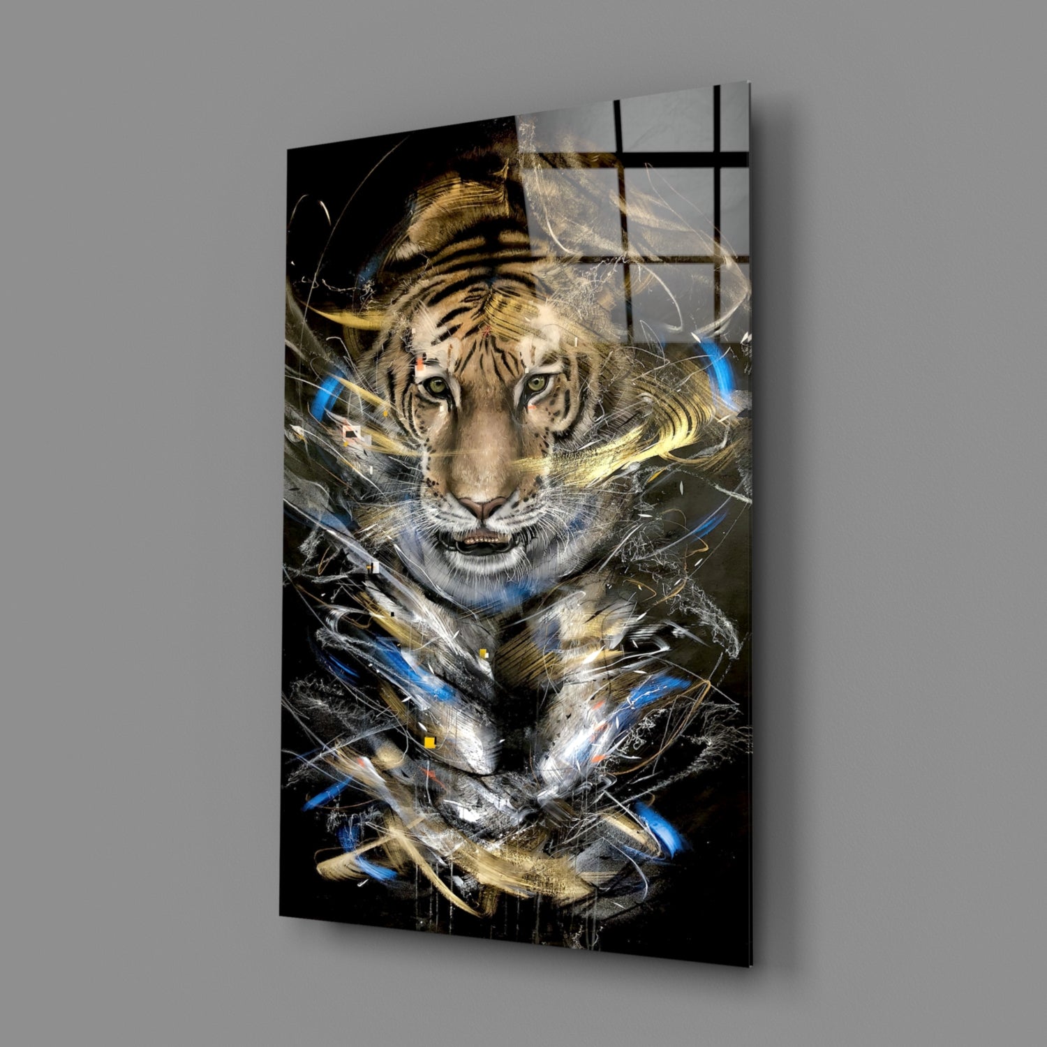 Angled view of a glass art panel featuring a tiger's face with blue and gold abstract brushstrokes on black background.