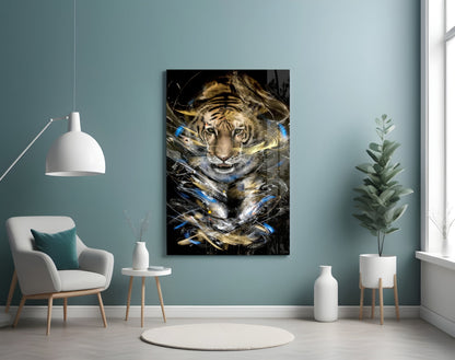 Tiger glass art depicting a tiger's face with gold and blue abstract streaks on black background, displayed on turquoise wall above white chair.