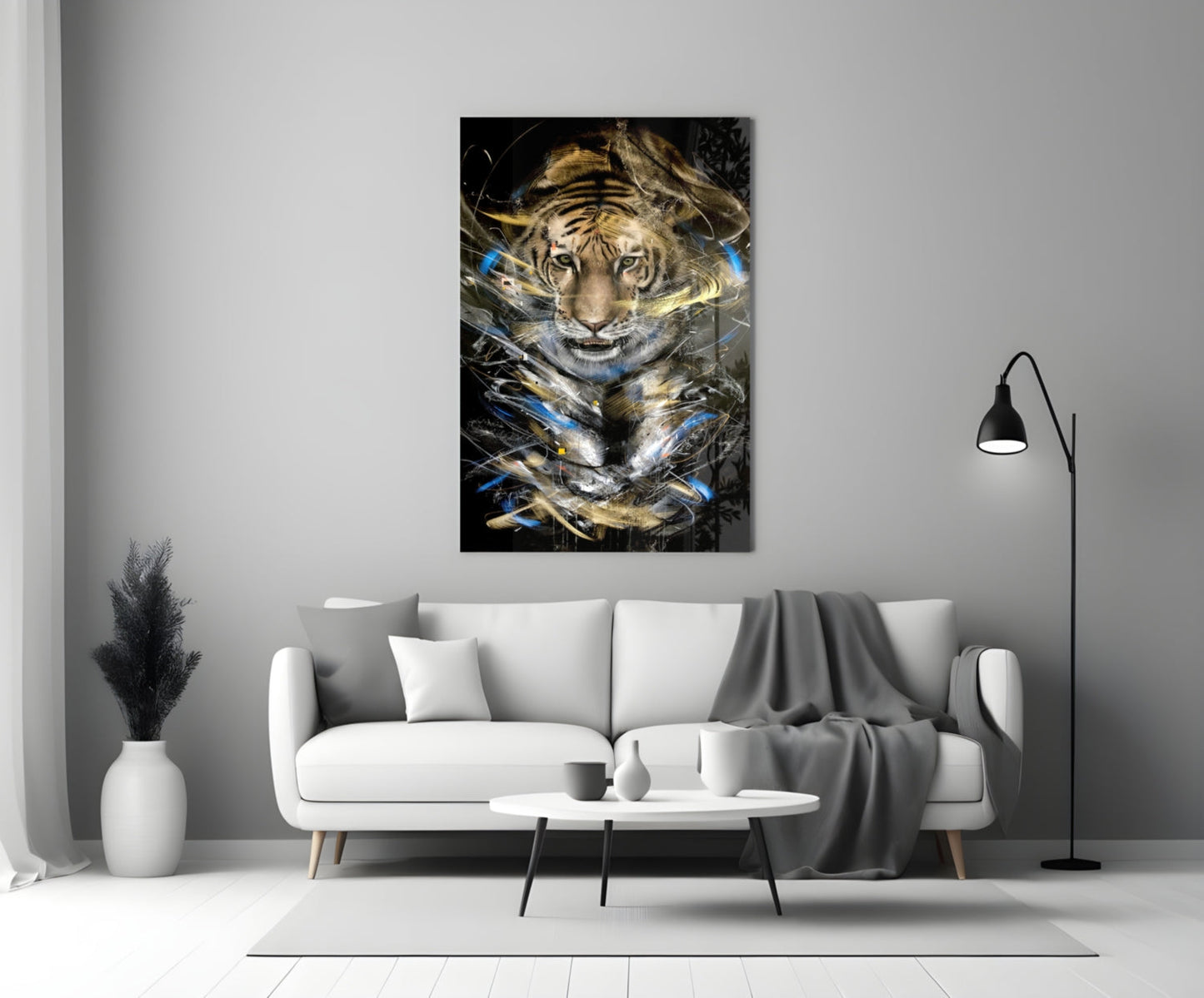 Tiger glass art with blue and gold abstract streaks displayed above white sofa in modern living room.
