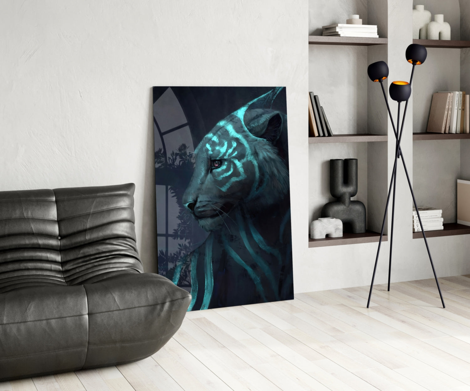 Neon tiger glass art displayed in modern living room beside gray leather sofa and floor lamp with black spheres.