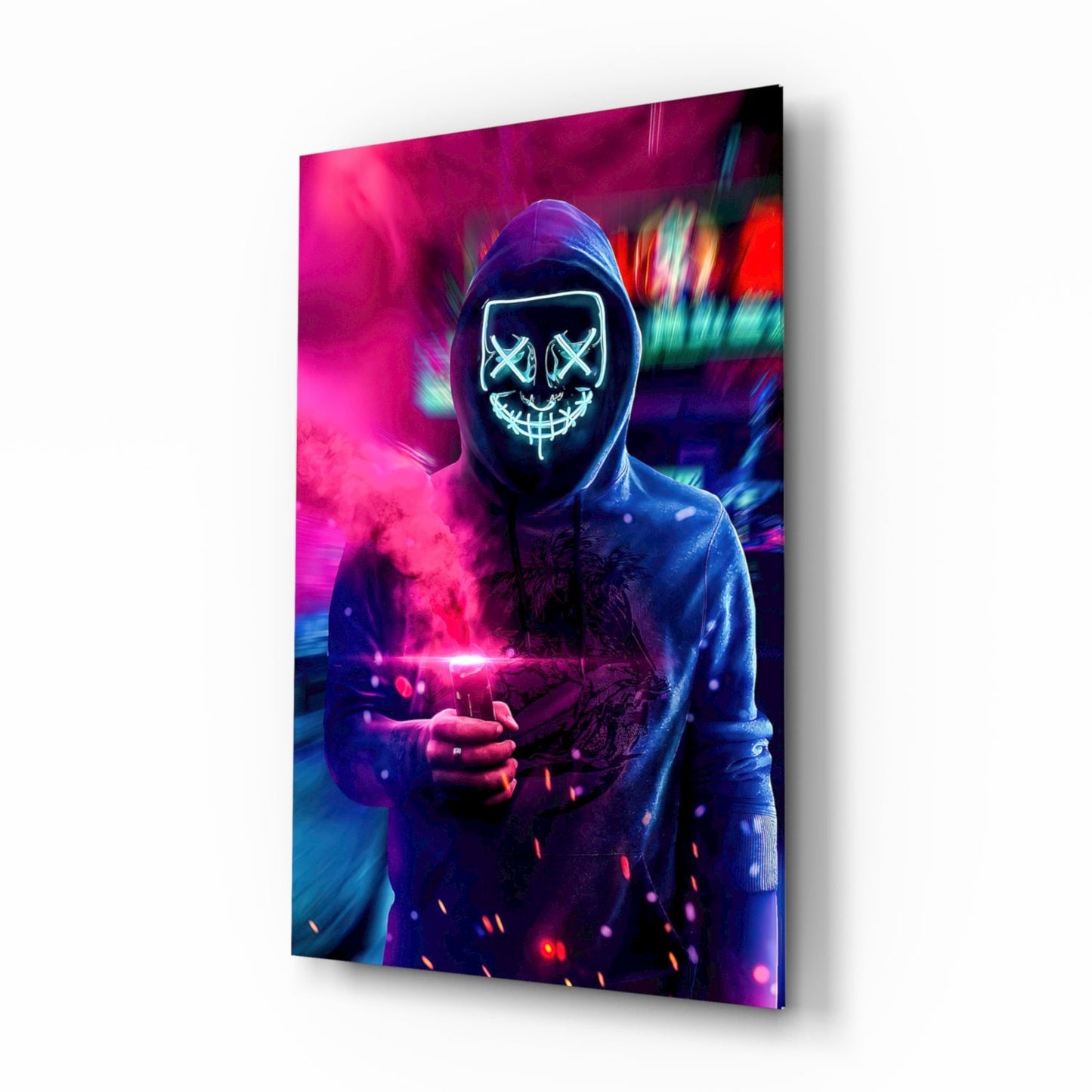 Angled view of glass art panel displaying neon-masked figure in hoodie holding glowing object against vibrant pink and blue background.