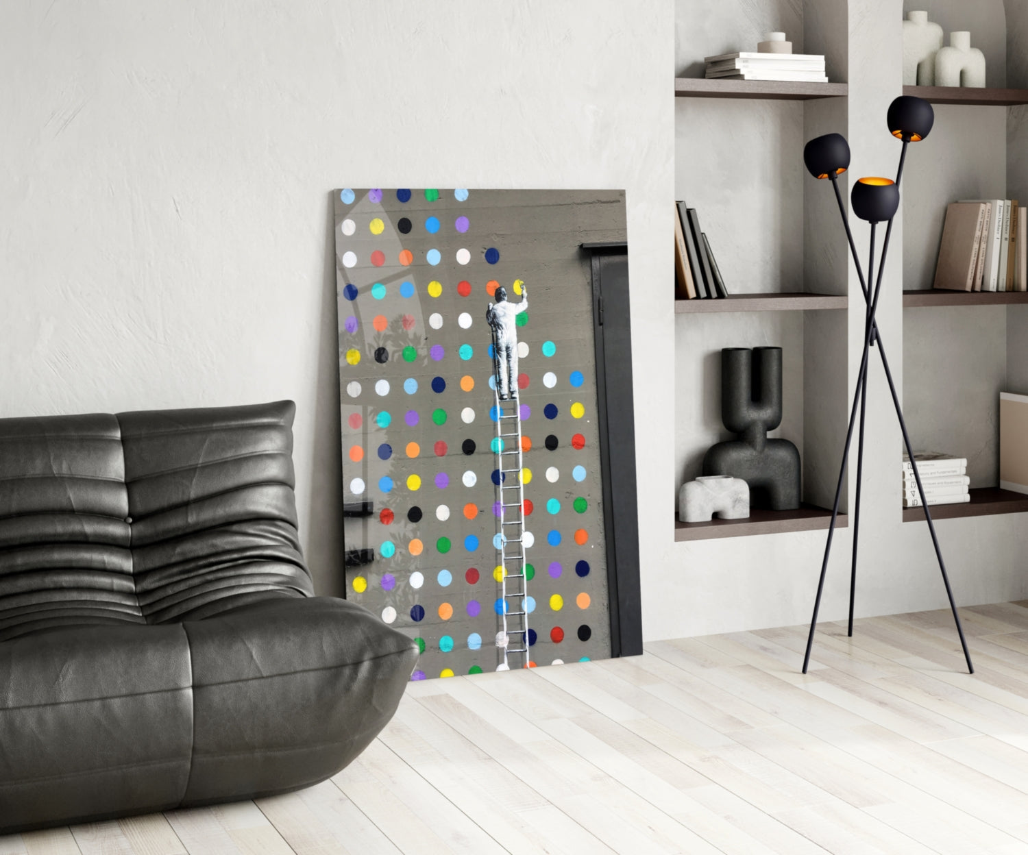Dots Glass Art displayed in modern living room setting with black leather sofa, floor lamp, and shelving unit.
