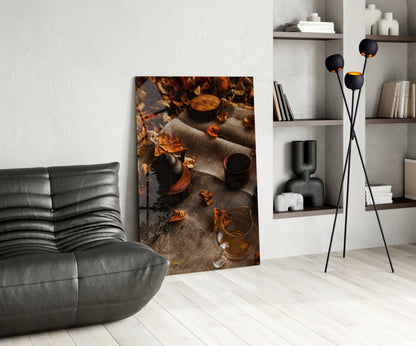 Autumn Picnic glass art displayed in modern living room setting with gray sofa, black floor lamp, and white shelving unit.