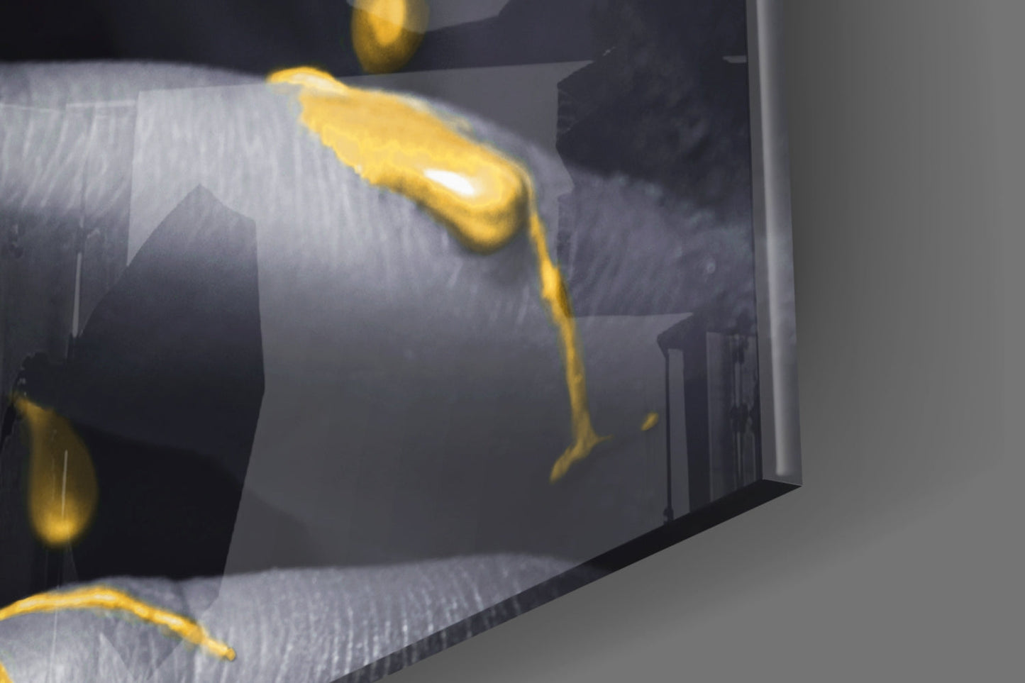 Close-up angled view of yellow lips glass wall art mounted on white wall, showing glossy yellow sculptural lips against dark background panel.