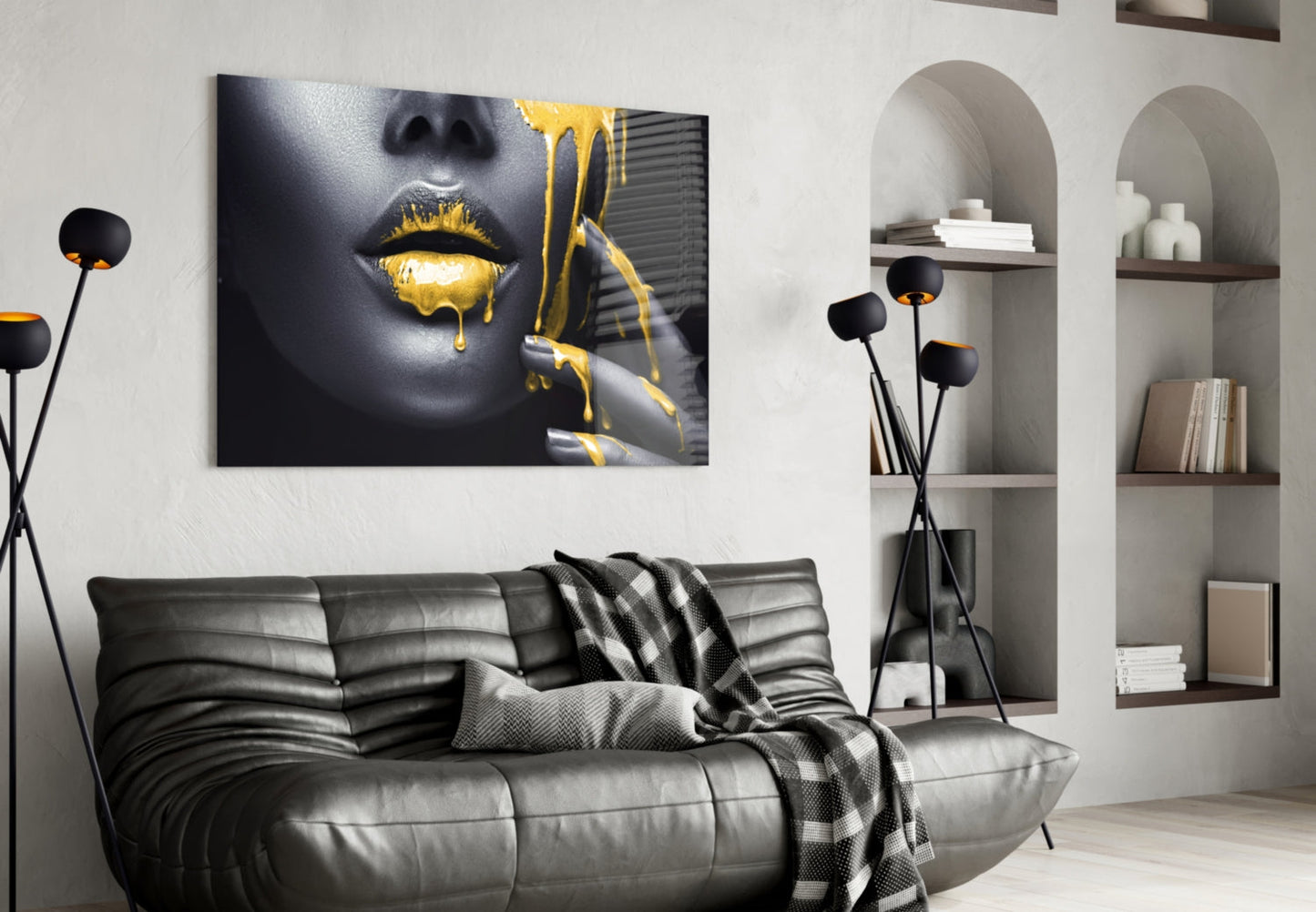 Yellow Lips Glass Wall Art displayed above black leather sofa in modern living room with shelving and black floor lamp.