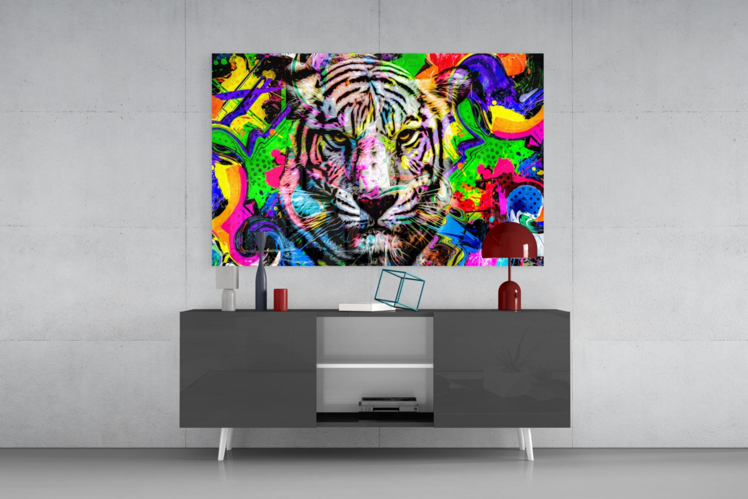 Vibrant multicolored tiger face glass art displayed above gray media console in modern room setting.