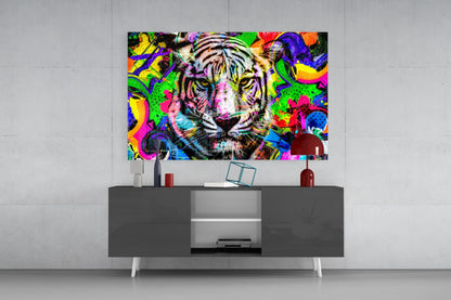 Vibrant multicolored tiger face glass art displayed above gray media console in modern room setting.