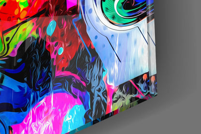 Colorful glass wall art panel displaying vibrant neon tiger stripes and abstract patterns in magenta, cyan, yellow, and blue against black.