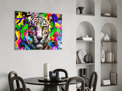Vibrant pop art tiger canvas displayed above a round black dining table with gray chairs in a modern interior with white shelving.