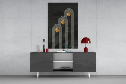 Three Dots Glass Wall Art with gold circles and white lines displayed above a gray console table with red lamp and decorative objects.