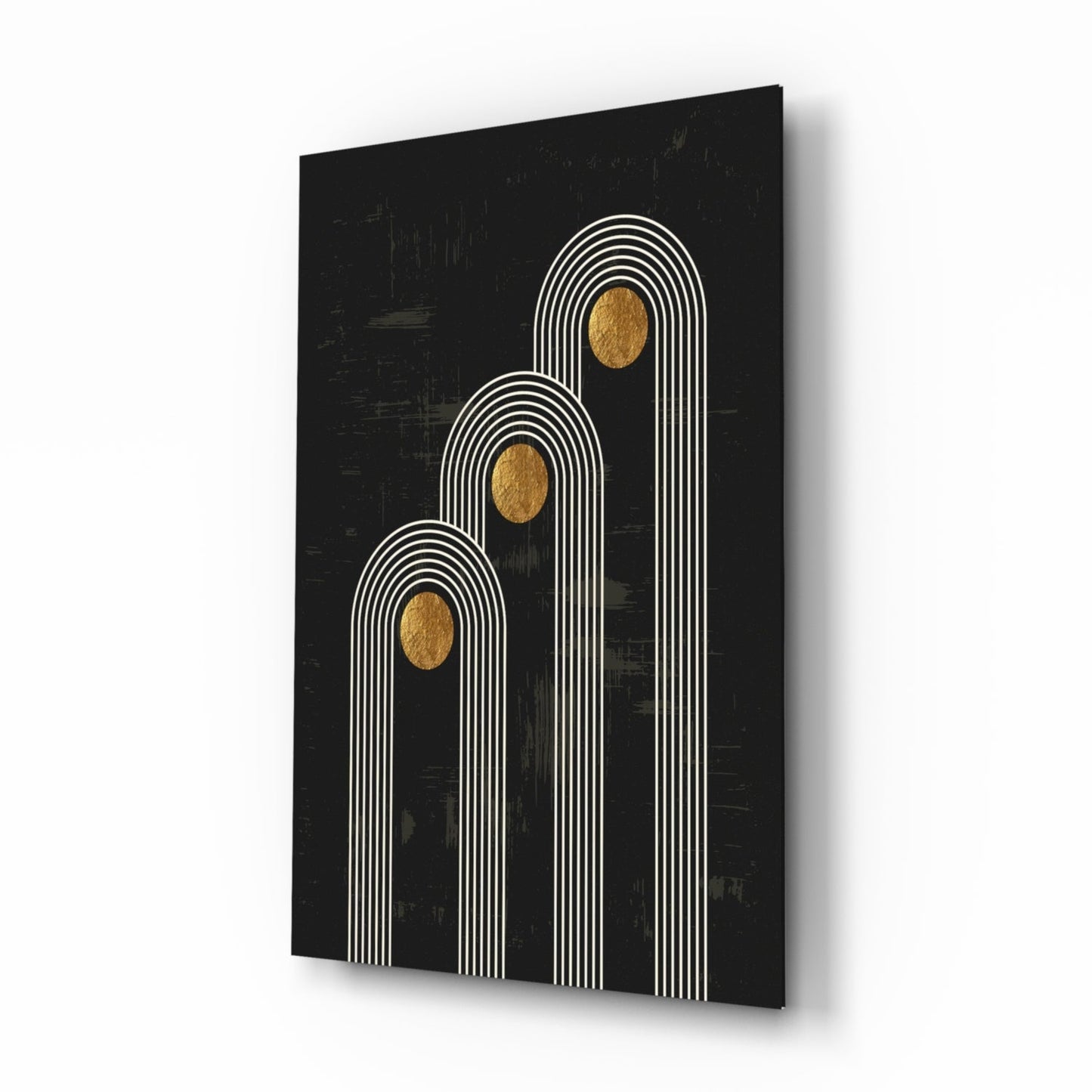Three vertical arched line designs with gold circles on black glass panel, angled perspective view showing depth and shadow.