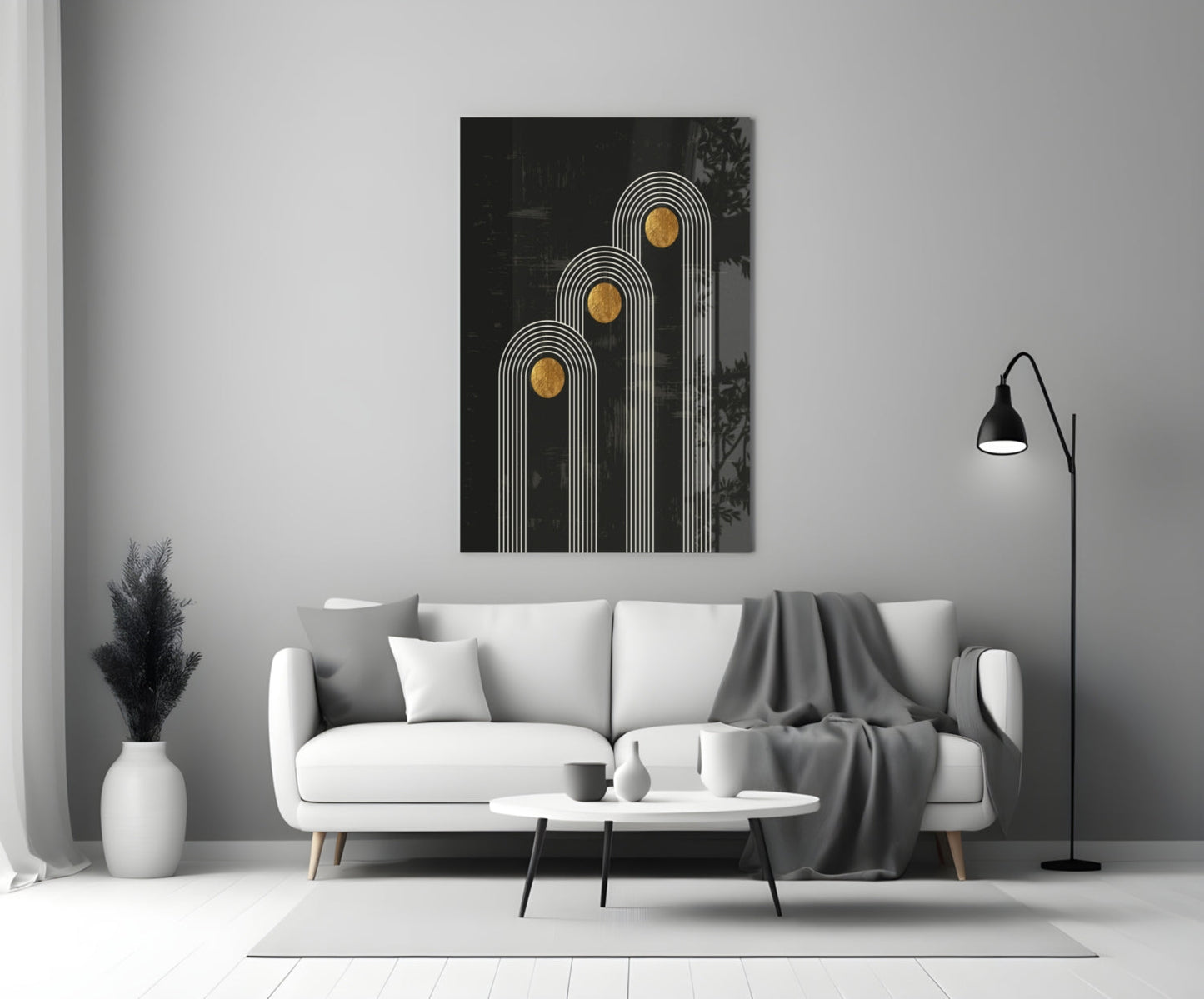 Three Dots Glass Wall Art with white linear arches and gold circles displayed above white sofa in minimalist living room.