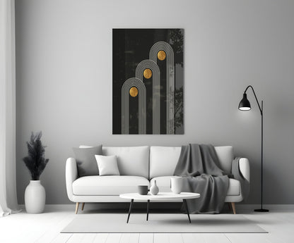Three Dots Glass Wall Art with white linear arches and gold circles displayed above white sofa in minimalist living room.