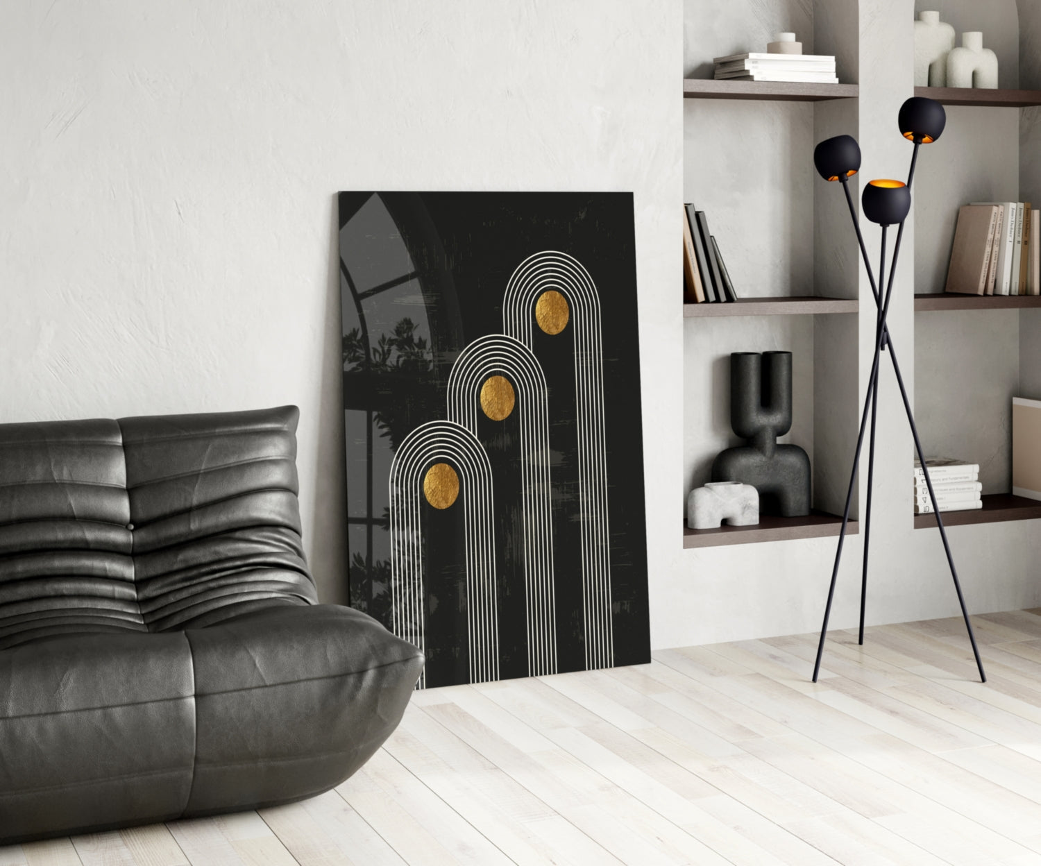 Modern living room interior displaying Three Dots Glass Wall Art with white lines and gold circles on black canvas, leaning against wall.