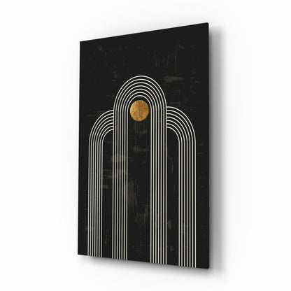 Black glass wall art featuring white concentric arches with a gold circle at the top, displayed at an angle.