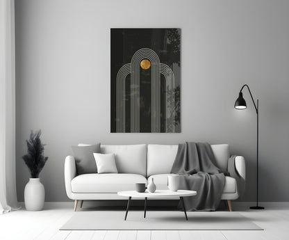 Modern living room styled with white sofa displaying black glass wall art featuring white concentric arches and gold circle detail above.