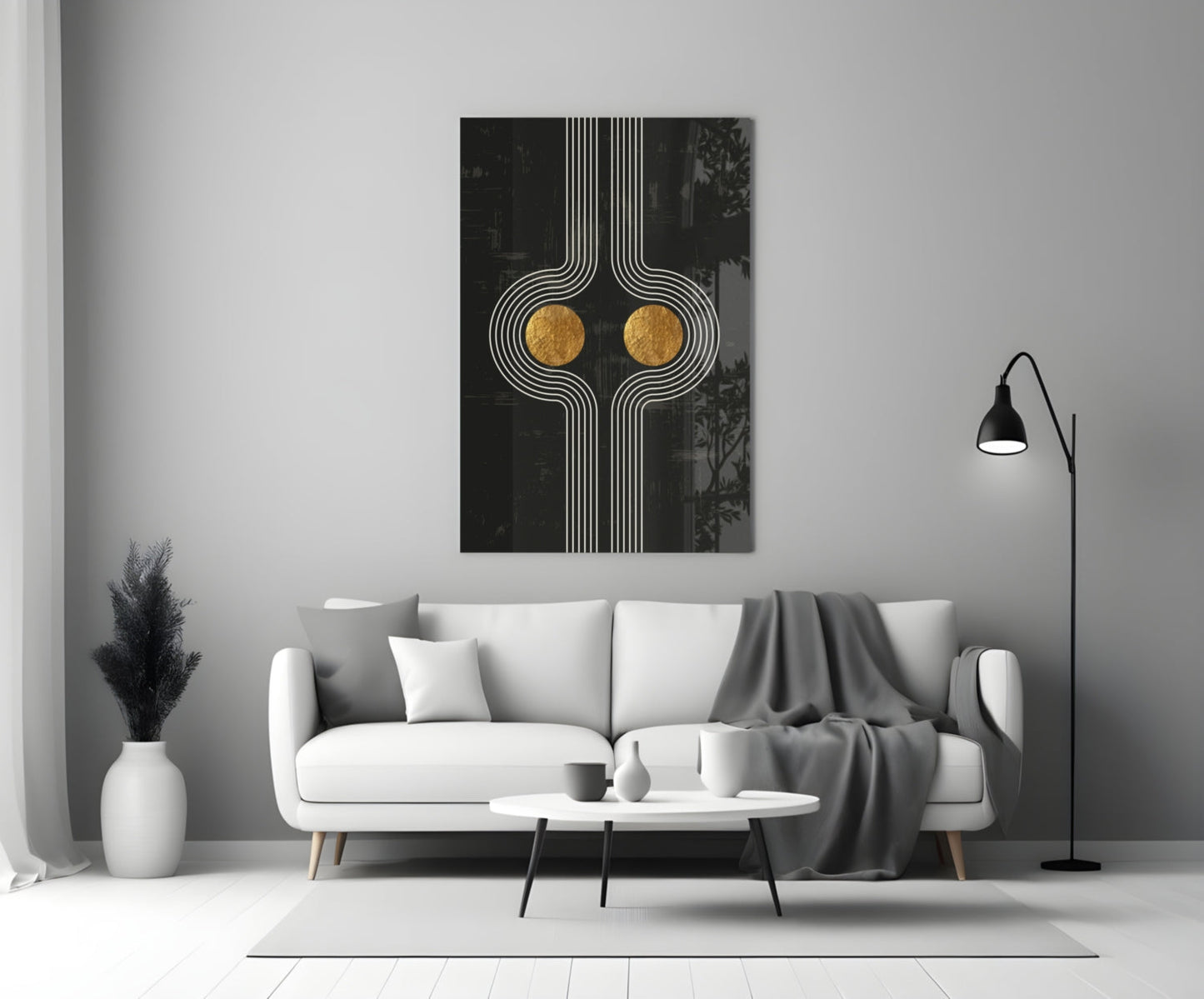 Modern living room with white sofa displaying black and gold geometric wall art with vertical lines and two gold circles above coffee table.