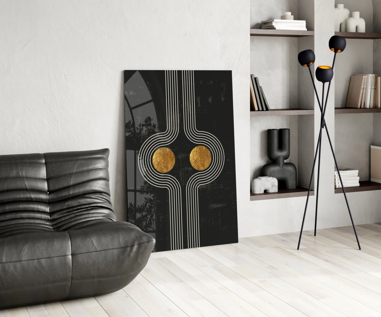 Modern living room interior displaying Two Dots Glass Wall Art with black and gold geometric design leaning against white wall.