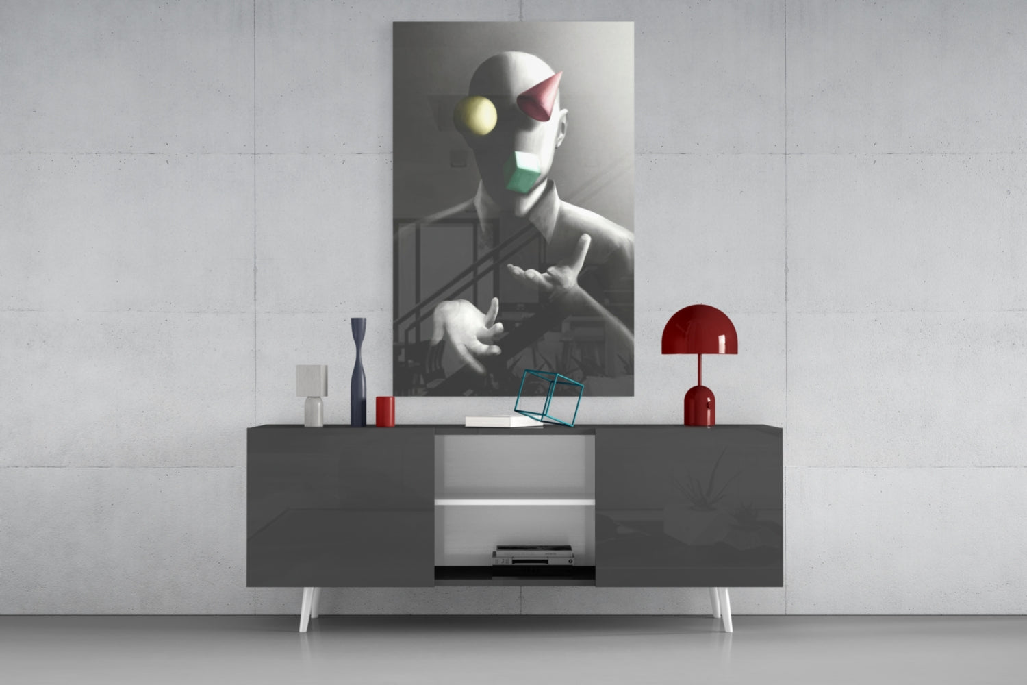 Juggler Glass Wall Art displayed above a dark console table with red lamp and decorative objects in a modern interior setting.