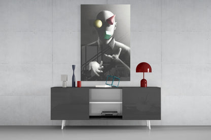 Juggler Glass Wall Art displayed above a dark console table with red lamp and decorative objects in a modern interior setting.