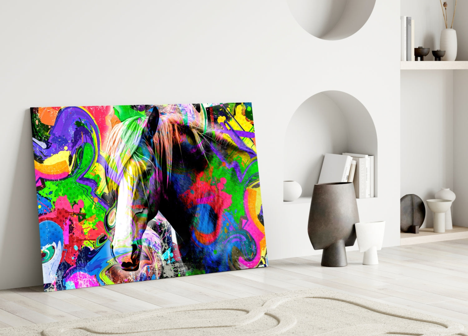 Vibrant multicolored horse glass art leaning against white wall in minimalist room setting with decorative objects.