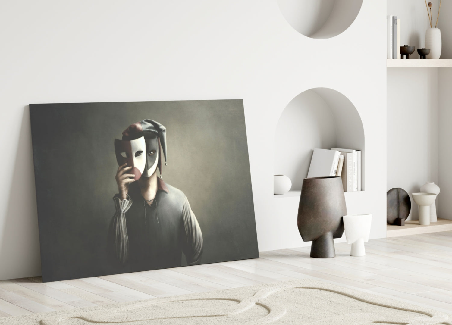 Masks glass wall art leaning against white wall in minimalist interior with shelving and decorative objects.
