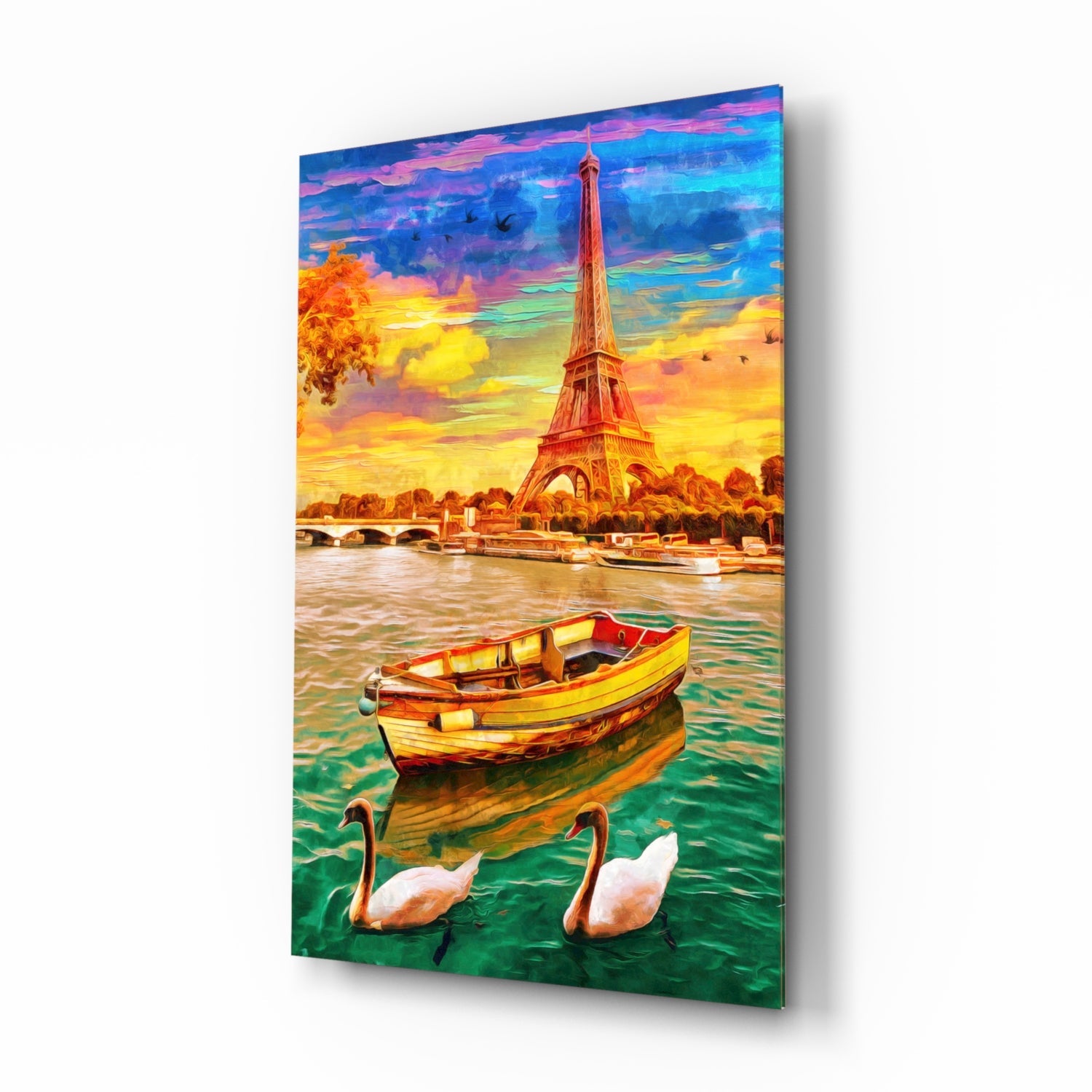 Colorful glass wall art depicting the Eiffel Tower at sunset with boats and swans on the Seine River below.