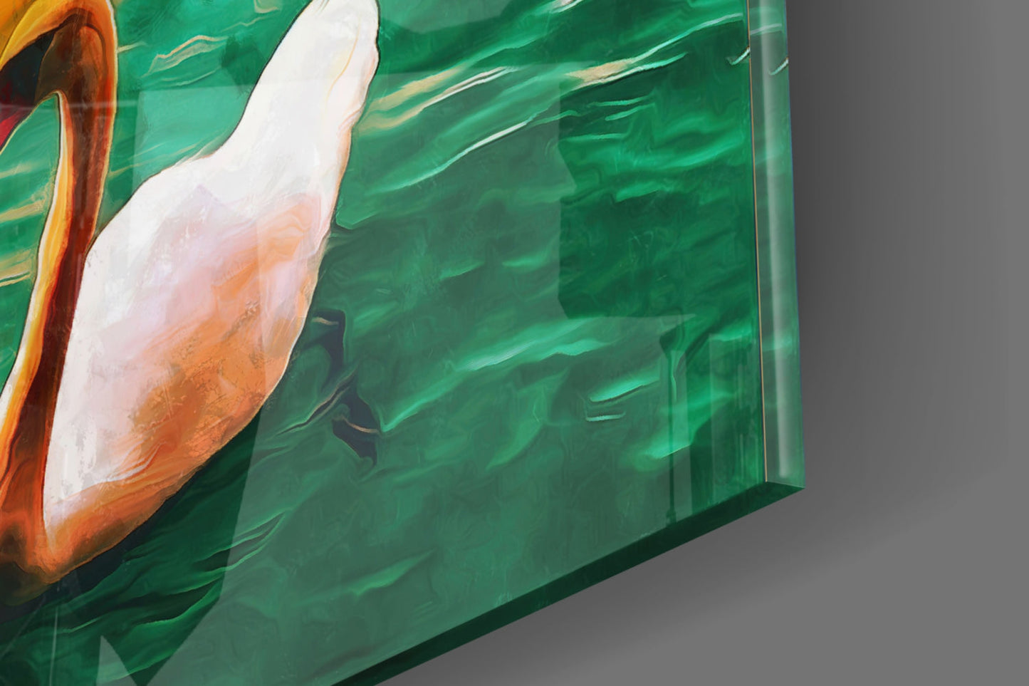 Close-up side view of green glass wall art with white and orange painted pelican design against brushstroke background.