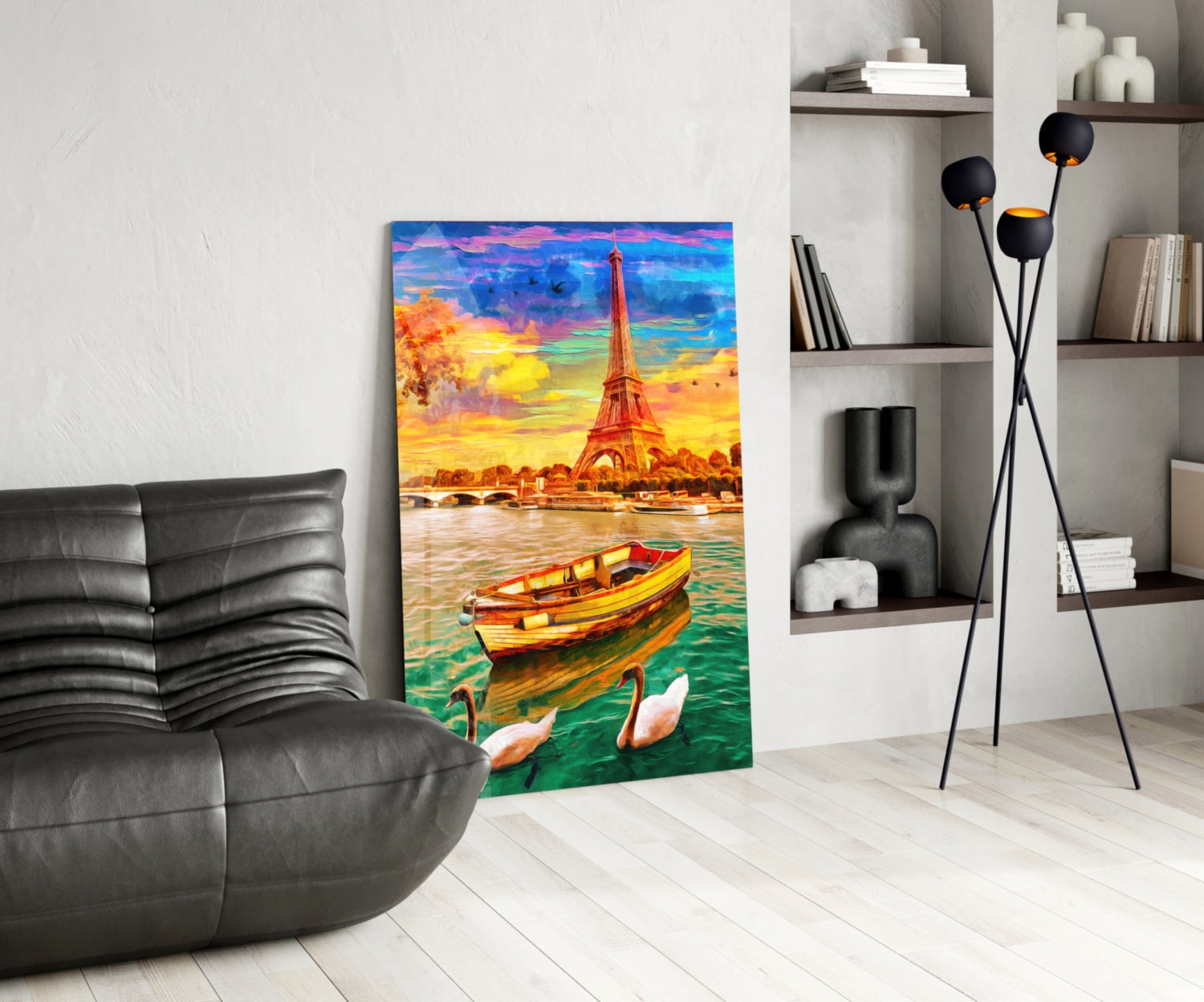 Vibrant glass wall art depicting Eiffel Tower sunset with colorful boat and swans, displayed in modern living room setting.