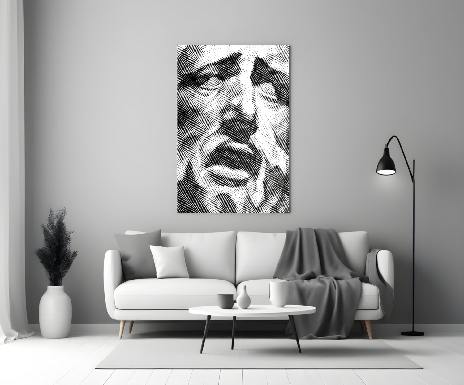 Black and white wavy striped glass art displayed above a white sofa in a minimalist living room interior.