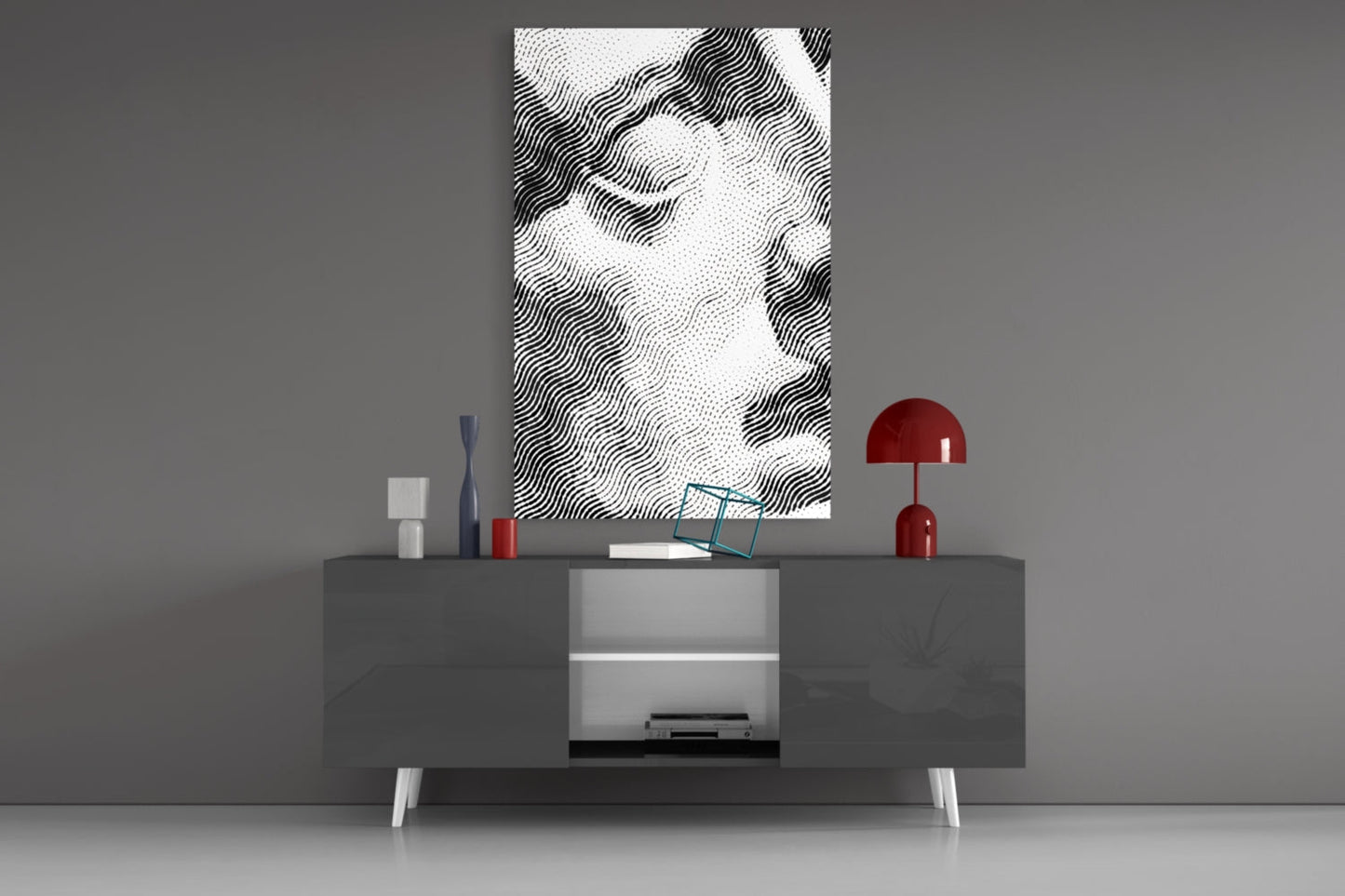 Black and white wavy pattern glass wall art displayed above a gray media console with red accents and decorative objects.