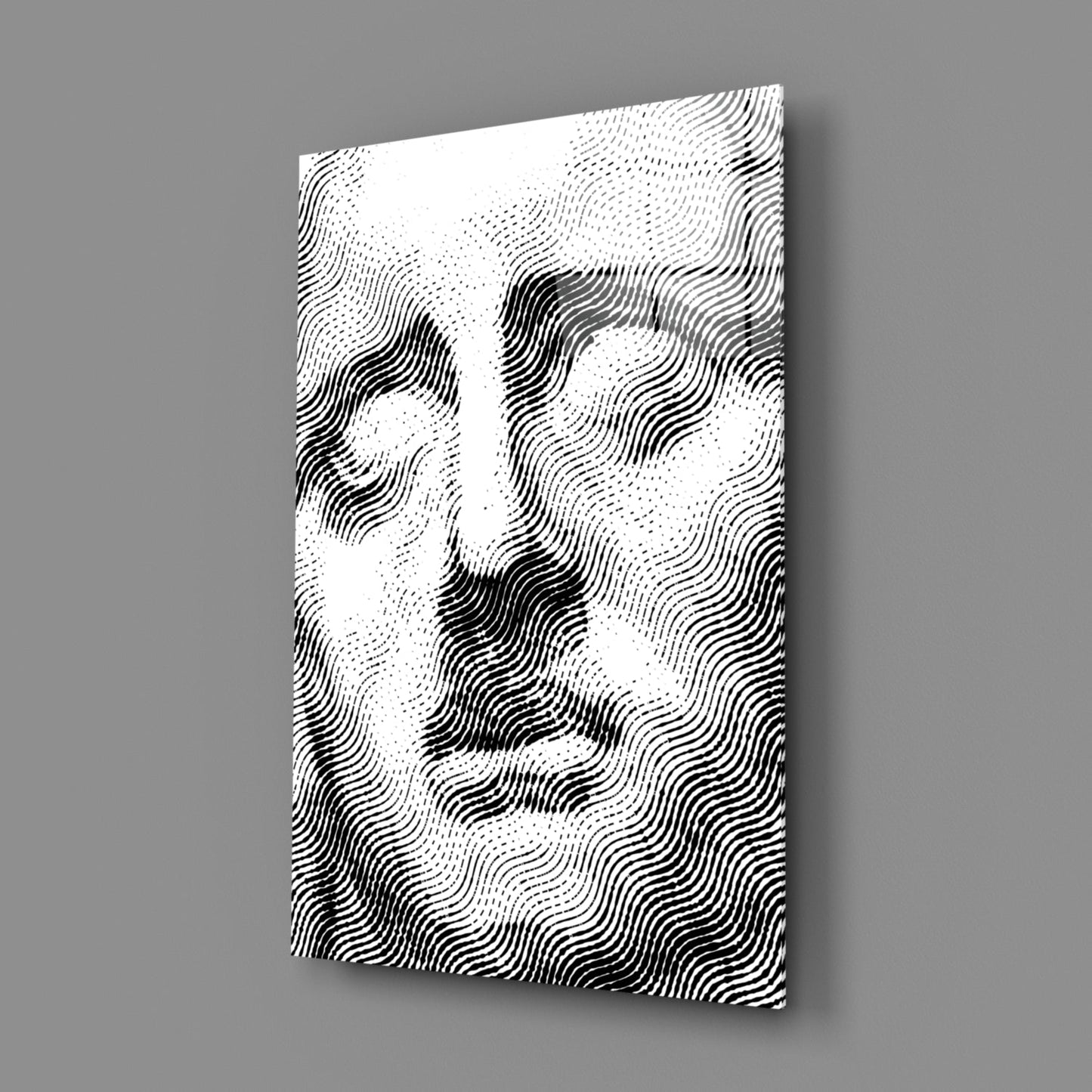 Angled perspective view of Sadness Glass Wall Art displaying black and white wavy line pattern against gray background.