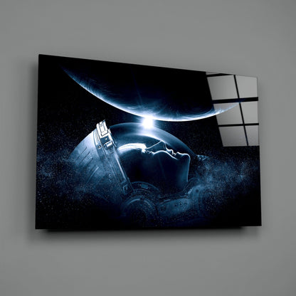 Angled view of framed wall art depicting an astronaut holding planets against a starry black background with blue lighting effects.