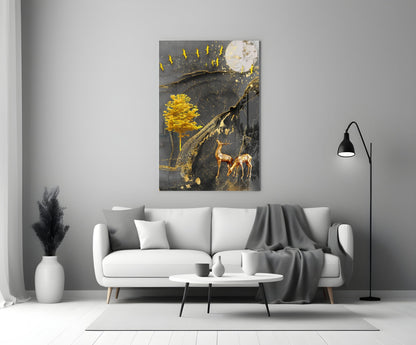 Golden Tree and Gazelles glass wall art displayed above white sofa in minimalist living room setting.