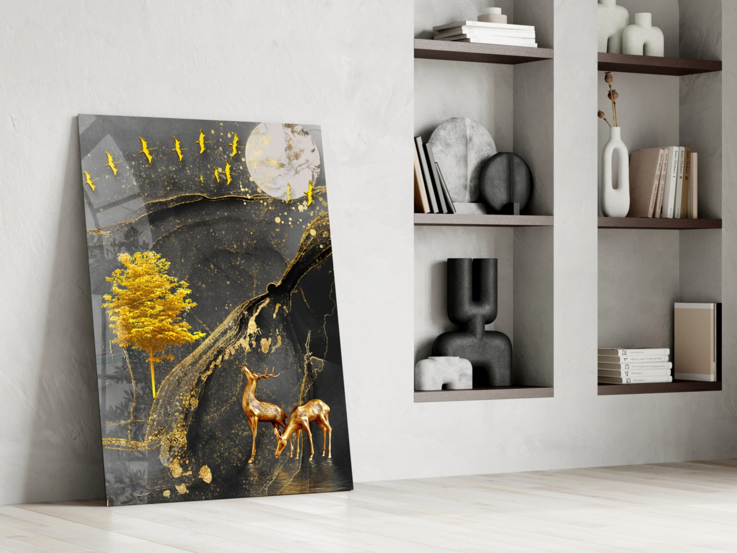 Golden tree and gazelles glass art leaning against white wall beside built-in shelving with decorative objects and books.