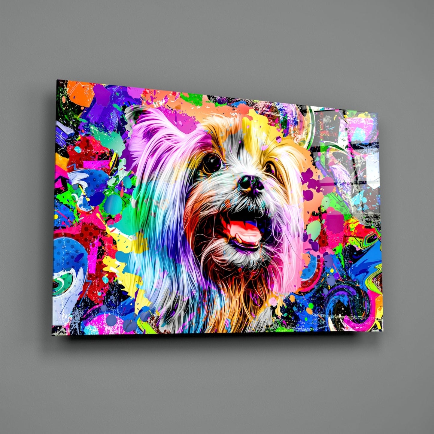 Colorful glass wall art featuring a smiling fluffy dog with rainbow paint splatter background, mounted on gray wall.