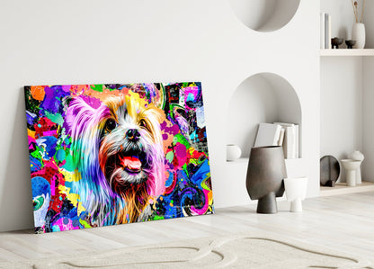 Colorful pop art glass panel featuring a smiling dog with rainbow fur against vibrant abstract background, leaning against white interior wall.