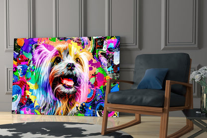 Vibrant multicolored glass wall art depicting a smiling dog's face displayed in a modern living room beside a wooden rocking chair.
