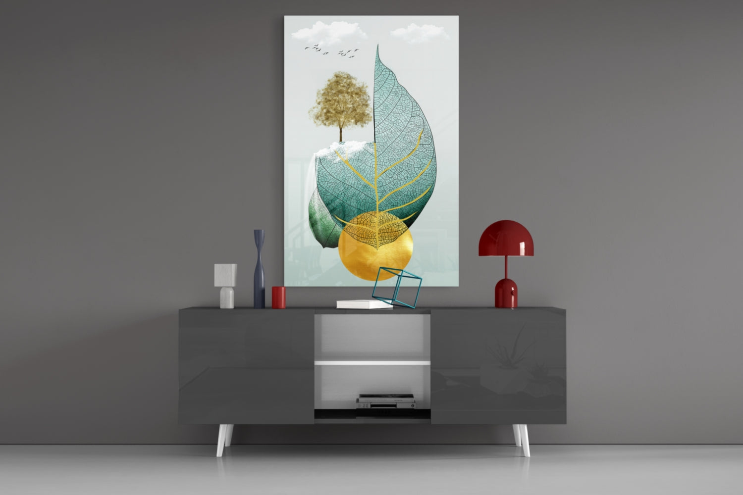 Modern living room display featuring Tree on a Leaf glass wall art above gray media console with red lamp and decorative accessories.