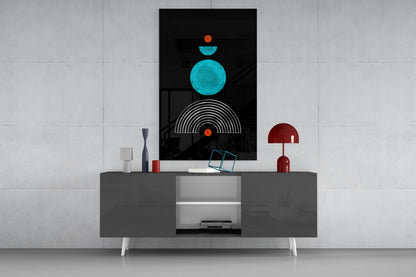 Modern living room with geometric wall art featuring turquoise circles and orange accents above gray media console.