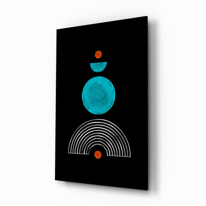 Modern glass wall art with geometric shapes: orange circles, turquoise circle and crescent, white semicircle lines on black background, angled perspective view.