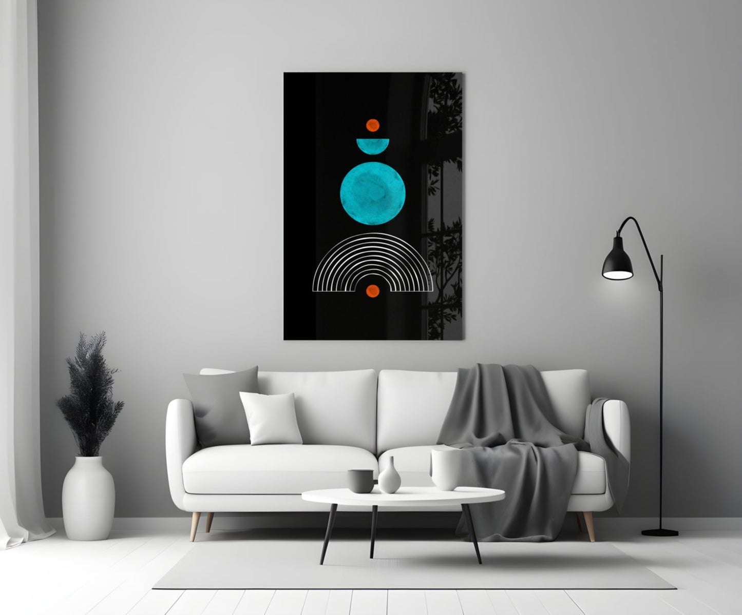 Modern living room with a white sofa displaying turquoise and orange geometric art above it.