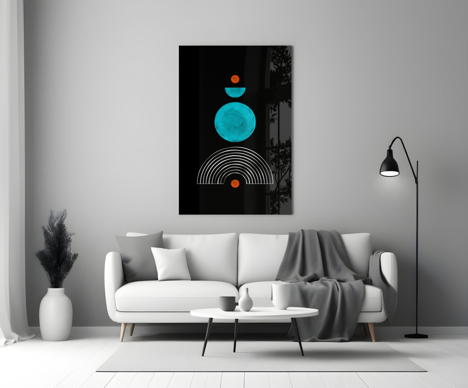 Modern living room with a white sofa displaying turquoise and orange geometric art above it.