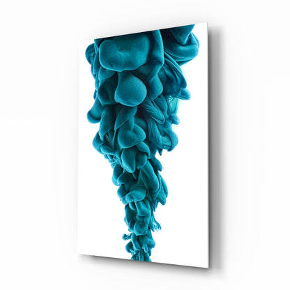 Vertical glass wall art displaying layered turquoise and teal flowing forms cascading downward against white background.