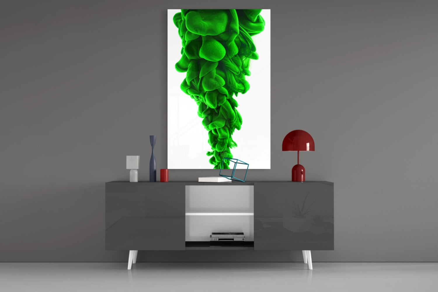 Green Layers Glass Wall Art displayed above a gray media console with red decorative lamp and accessories.