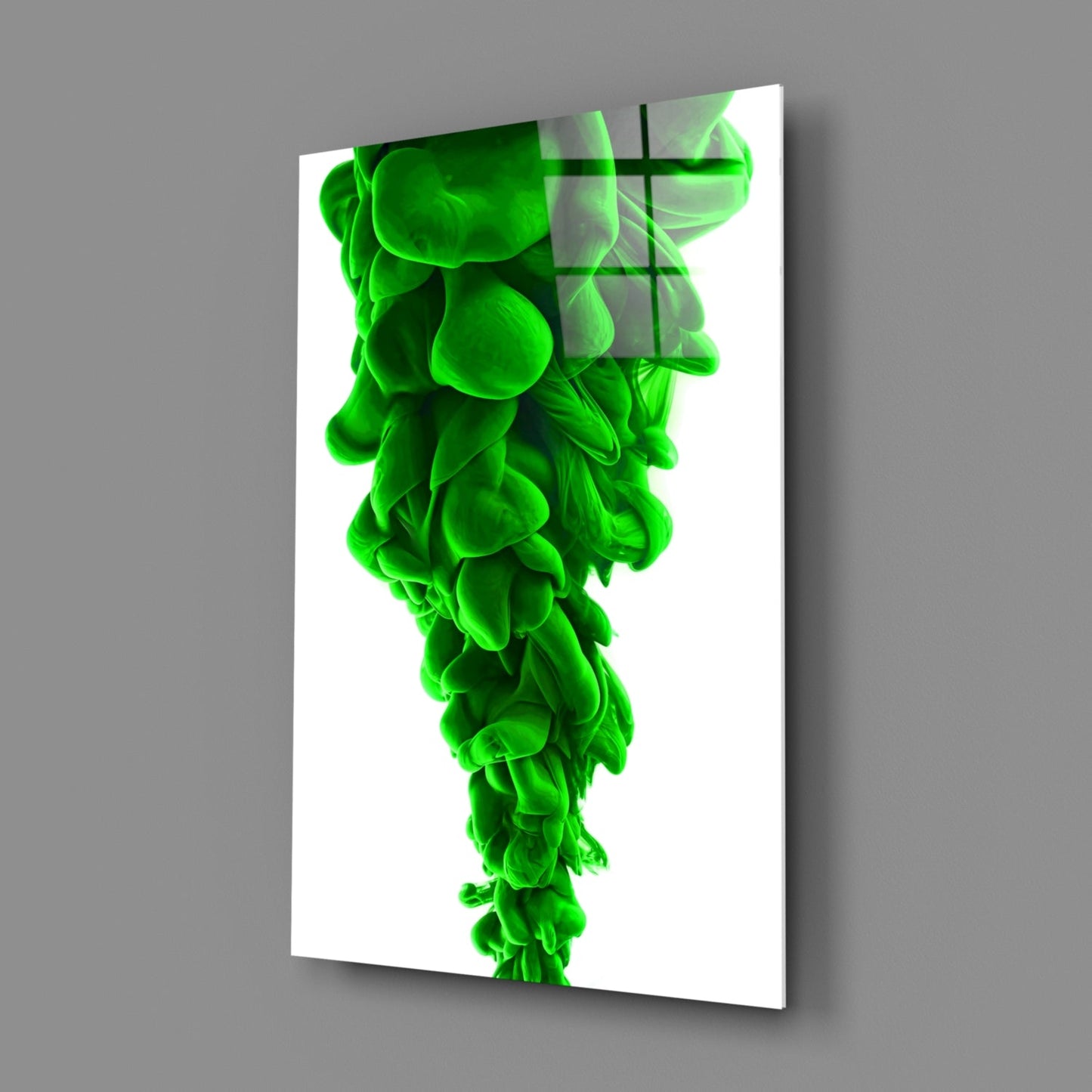 Angled side view of green layered glass wall art with geometric black lines overlaid on luminous green fluid forms against white background.