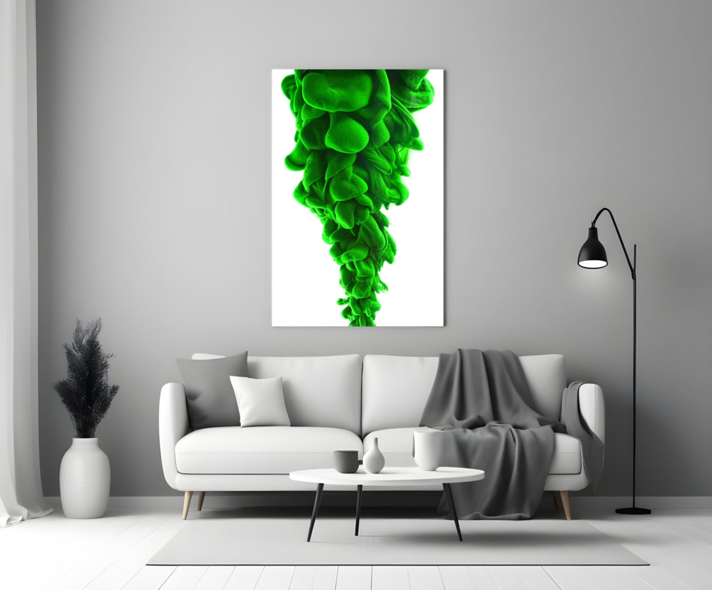 Green Layers Glass Wall Art displayed above a white sofa in a minimalist living room setting.