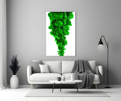 Green Layers Glass Wall Art displayed above a white sofa in a minimalist living room setting.